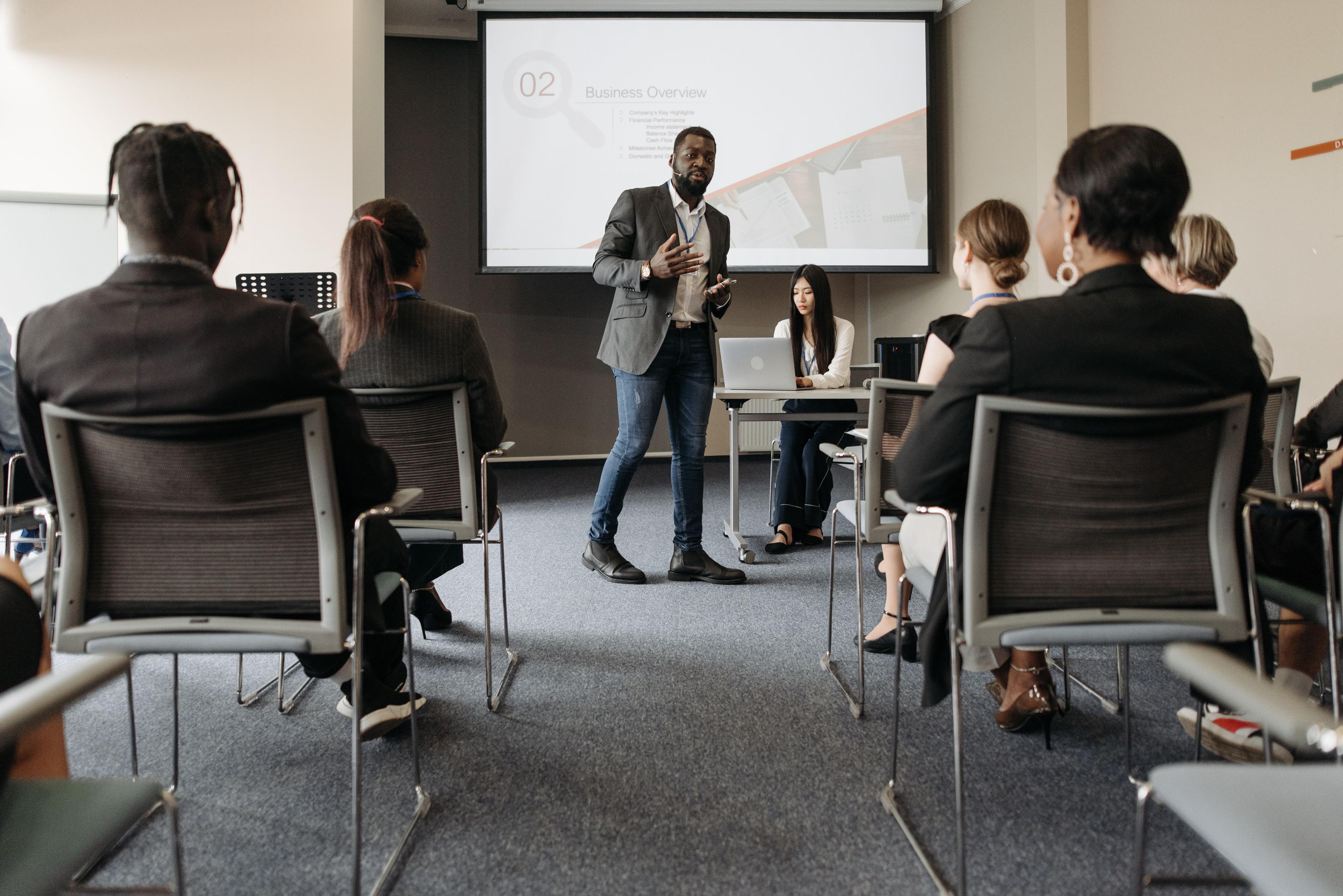 A training session in progress around a meeting table